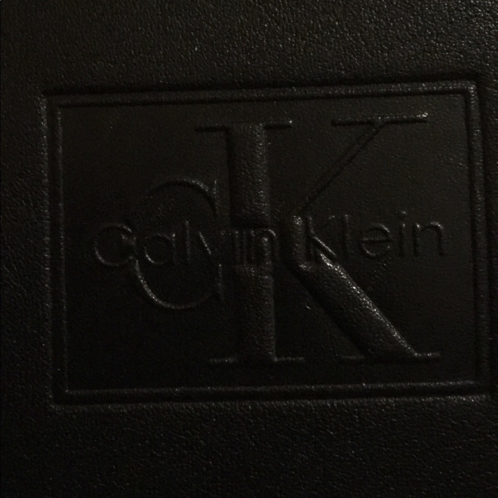 Calvin Klein means black leather wallet